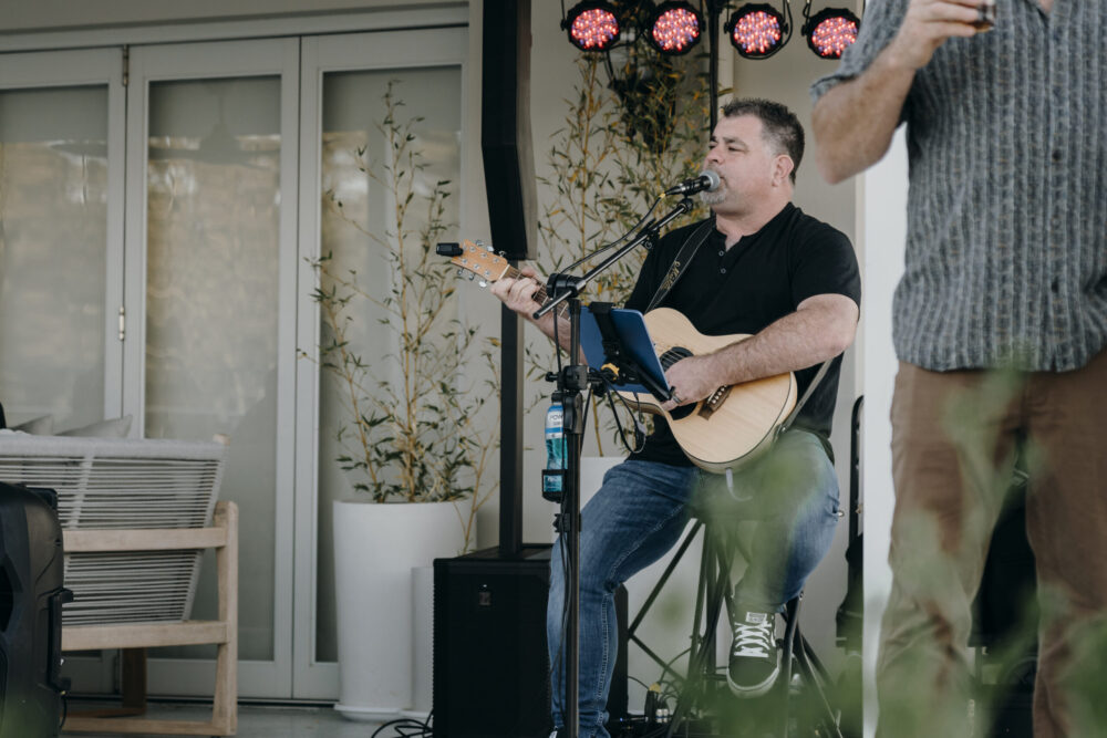 Shane performing at a professional corporate event
